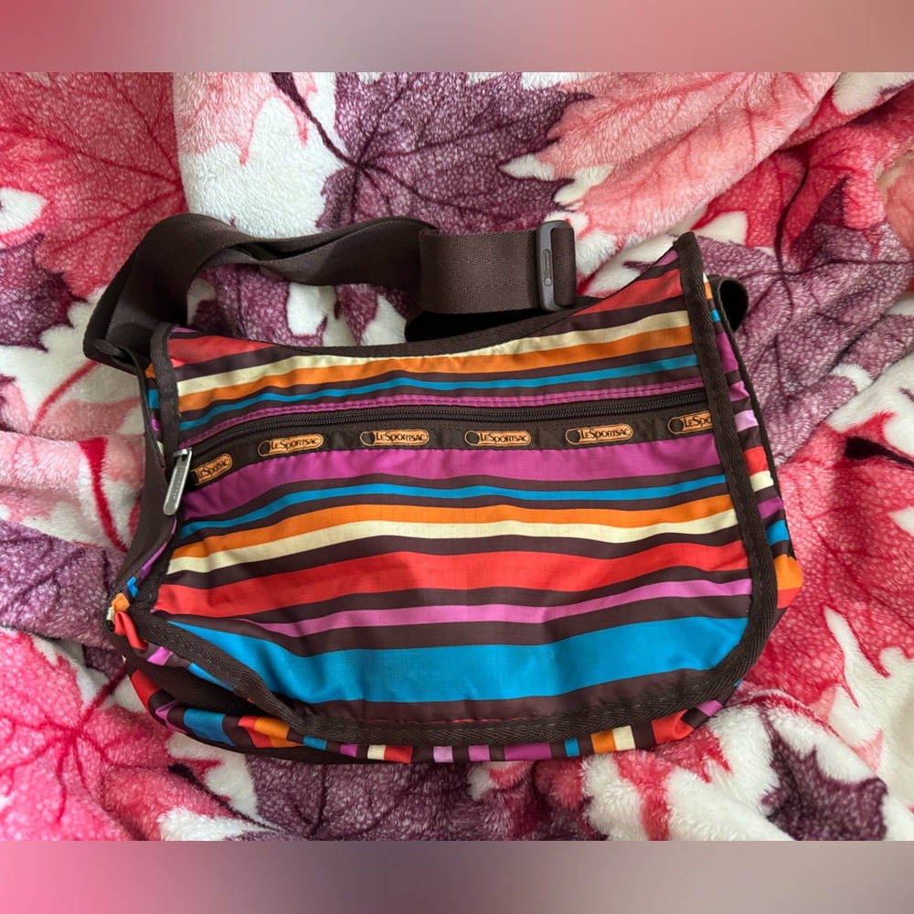 Vintage LeSportsac Striped purse 11”X7”H 3 zippers one small zipper inside